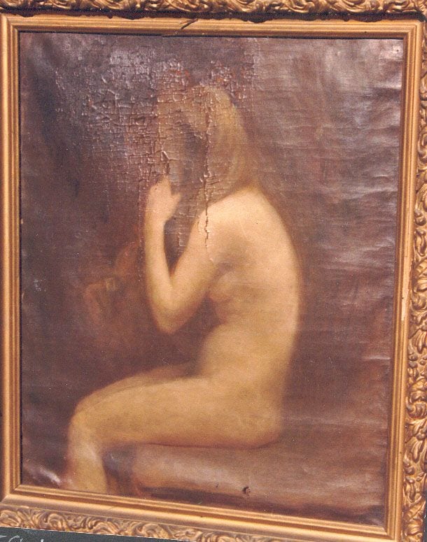 Historical photograph of Model brushing her hair, 1900 from the family album