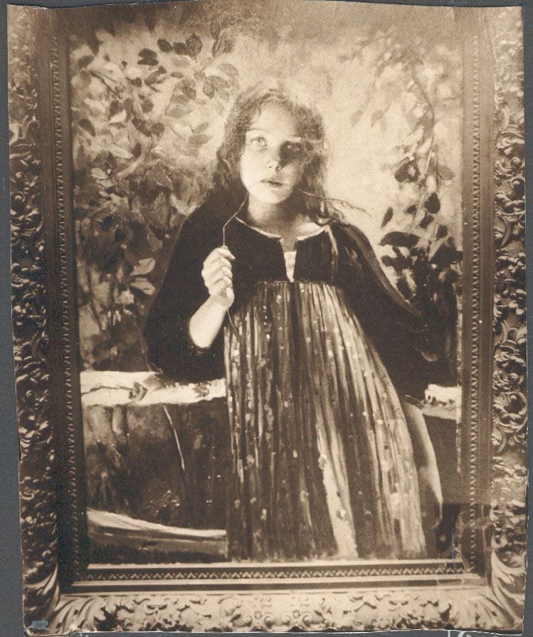 Historical photograph of Nadya By The Fence, 1902 from the family album
