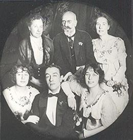 Group photograph with Victor Stember seated at center and Peter Carl Faberge standing directly behind him