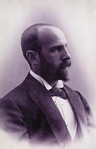 Victor Stember as a young man, in profile, with a dark beard