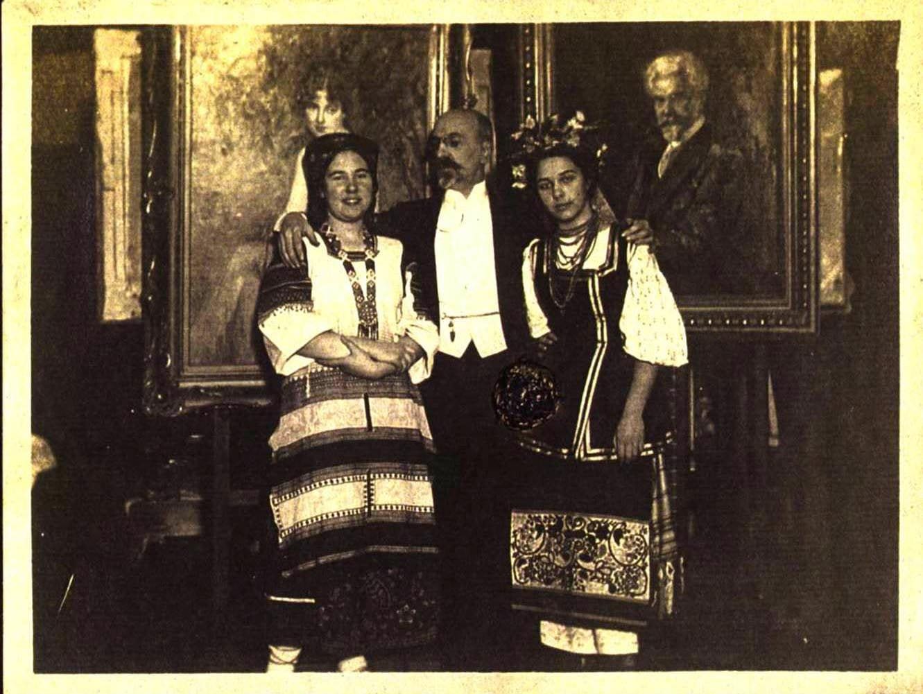 The artists daughters Natasha and Sonja are shown in native costumes for a festival. As Stember has