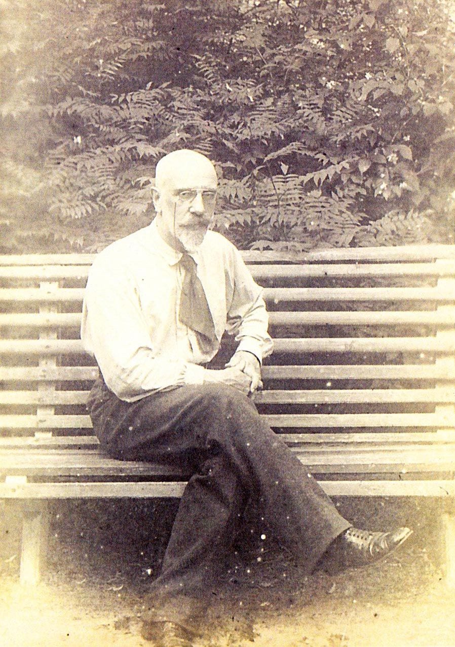 Viktor Karlovich Stember on a park bench.