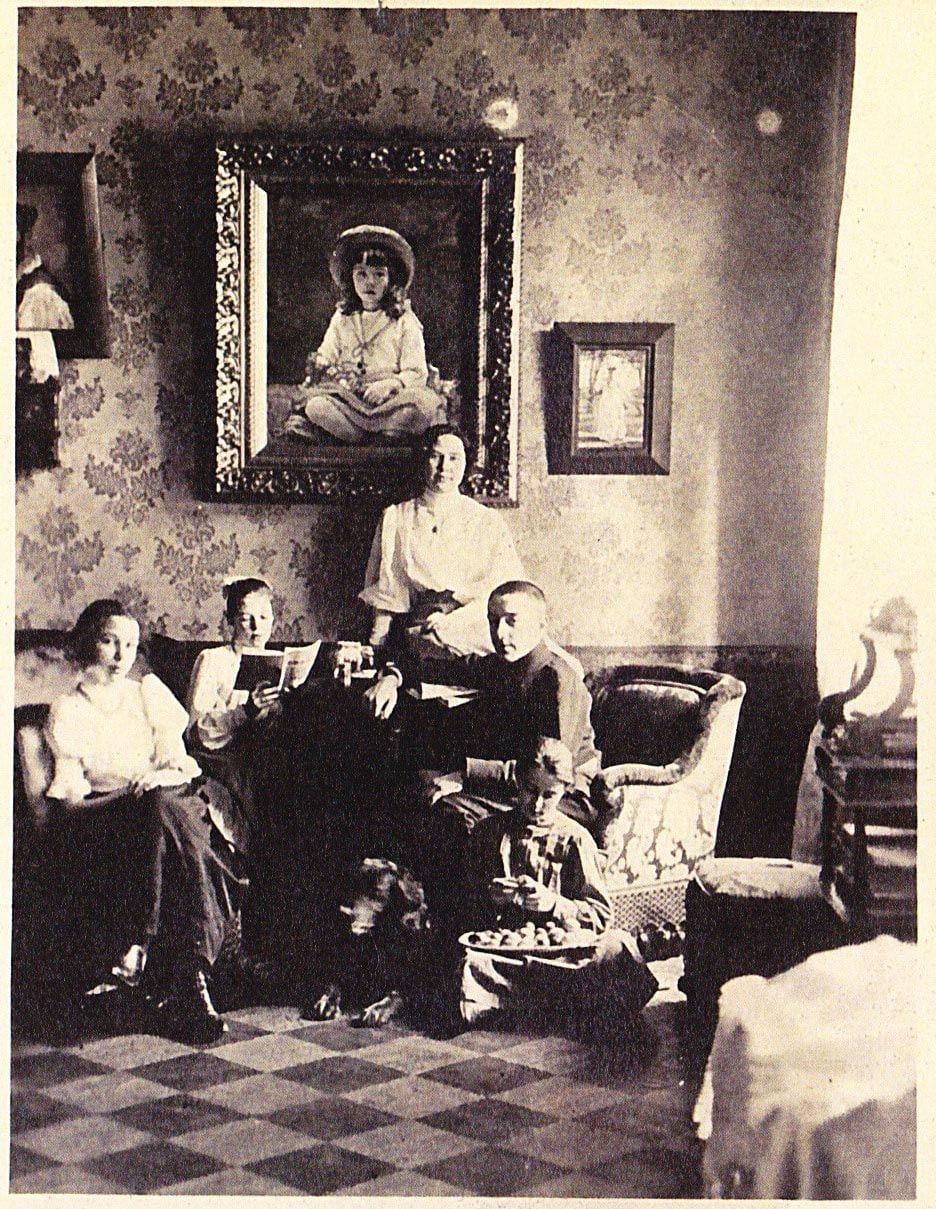 Relaxing at home. There are several photos like this in the family albums (see photo #4) where the c