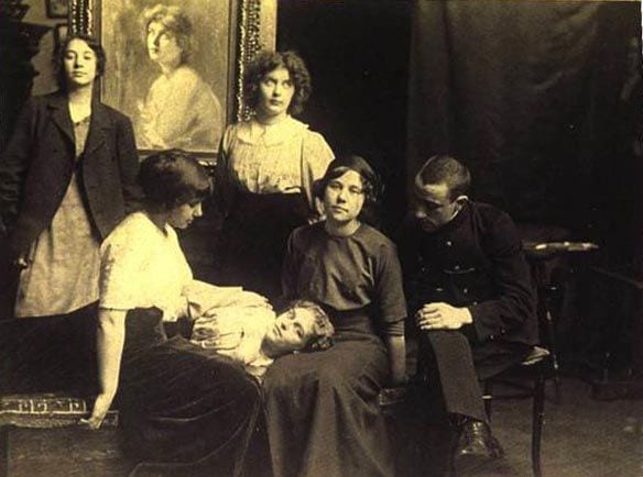 Painting #76, 'Head of a Young Girl'on this site is seen surrounded by the artists son Nicholas, dau